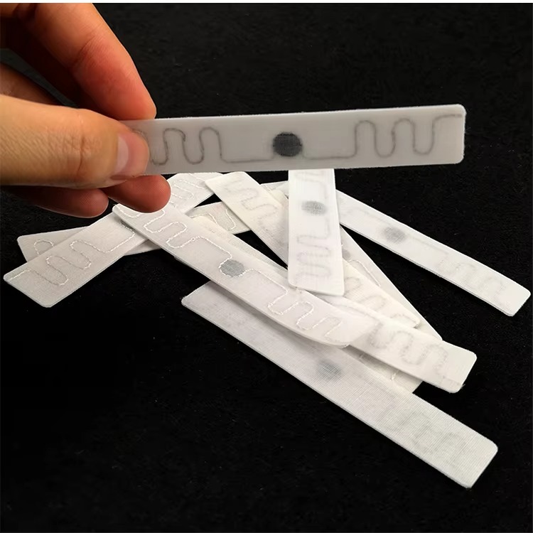 Sewing type UHF RFID laundry tags